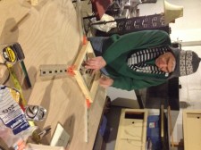 Eric braces the small window.