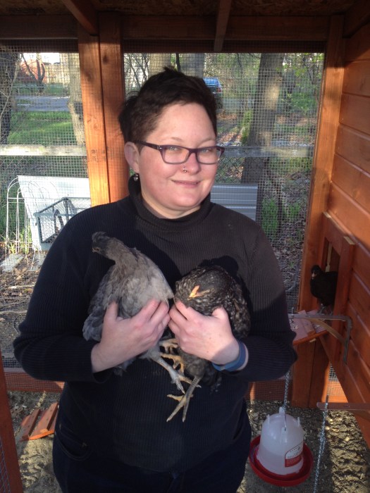 I know it looks like I have a death grip on Gigi and Nellie, but they wiggled loose just before this photo was taken. I swear! Loretta (peeking out of the door) witnessed the whole thing!